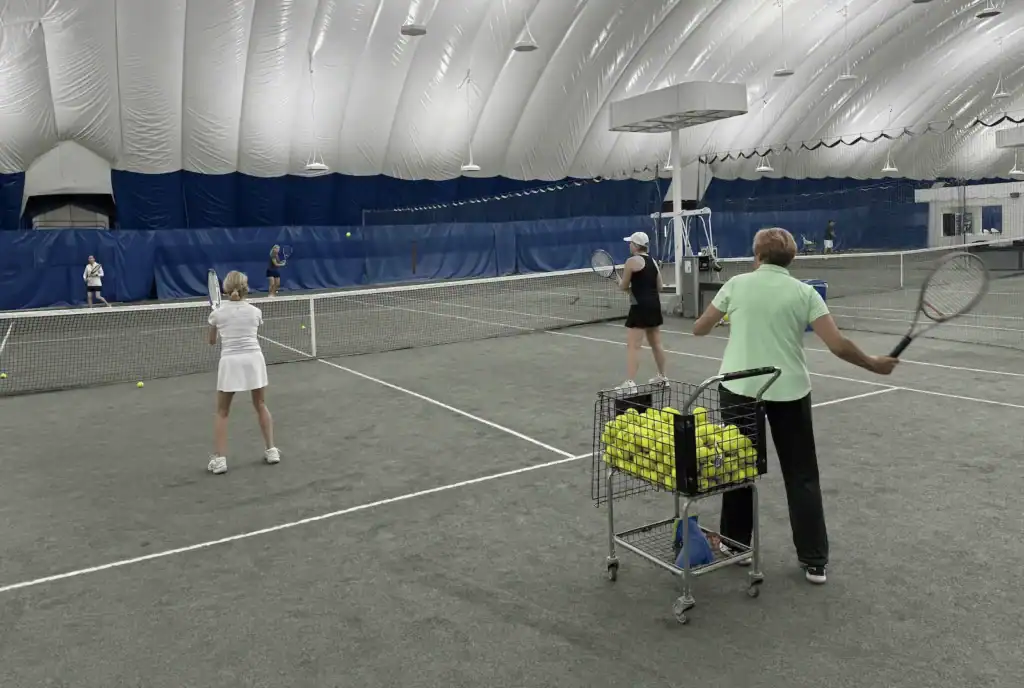Anne Hobbs on an NYC indoor tennis court.