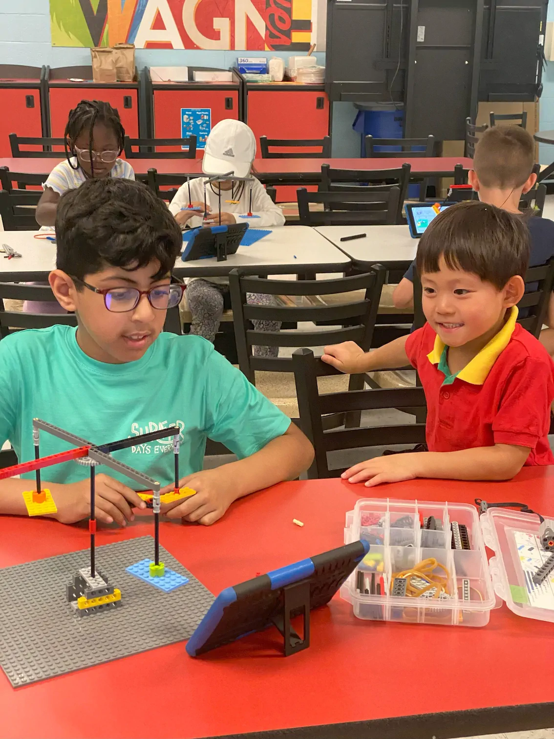 Two boy campers playing with Legos at an Advantage day camp in New York City.